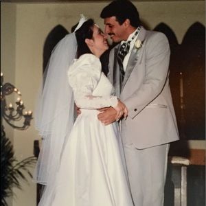 White wedding dress and 3- tierveil